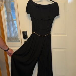 Coco Bianco Black Off-Shoulder Jumpsuit with Gold Chain